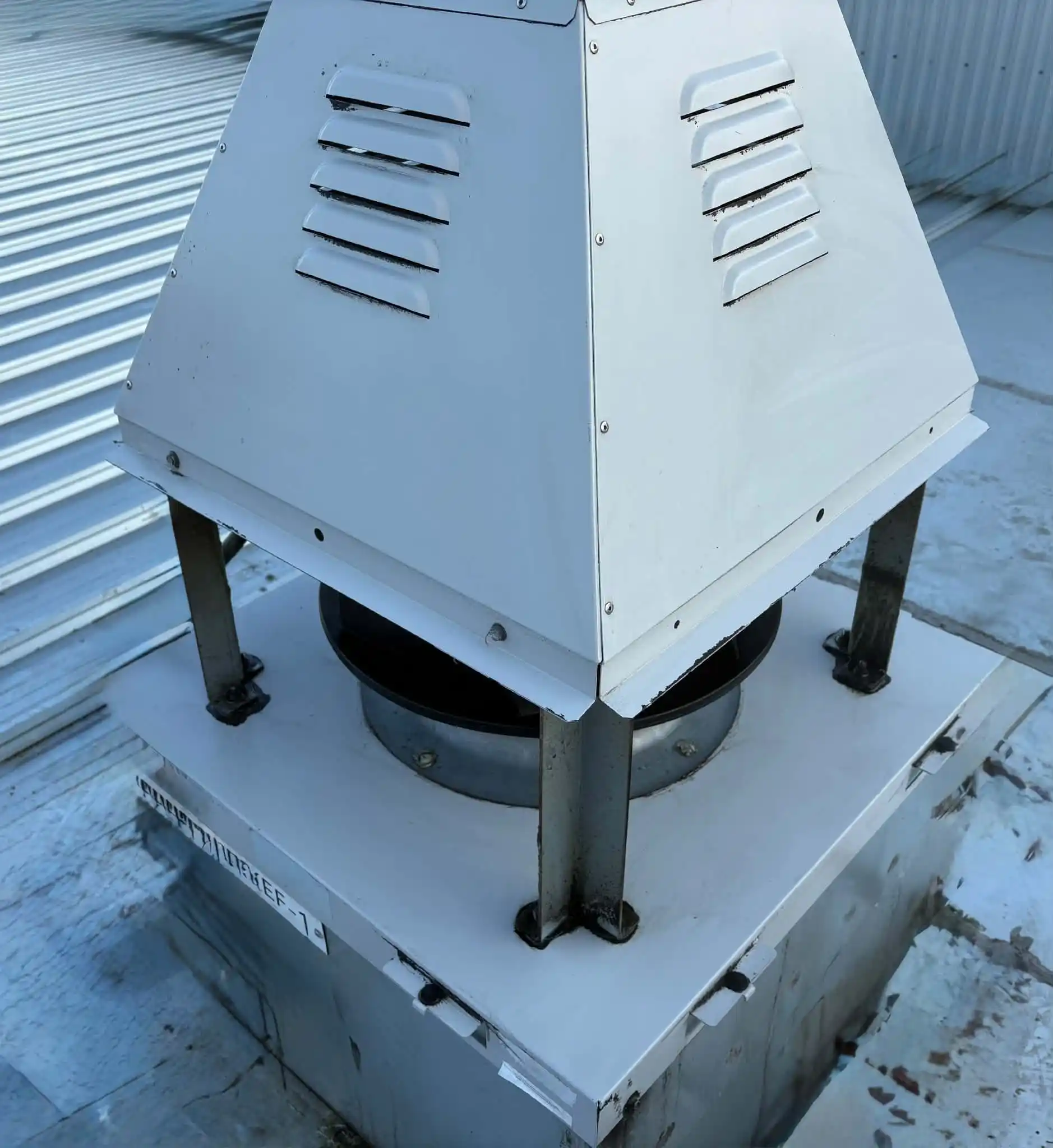Rooftop exhaust fan housing after cleaning